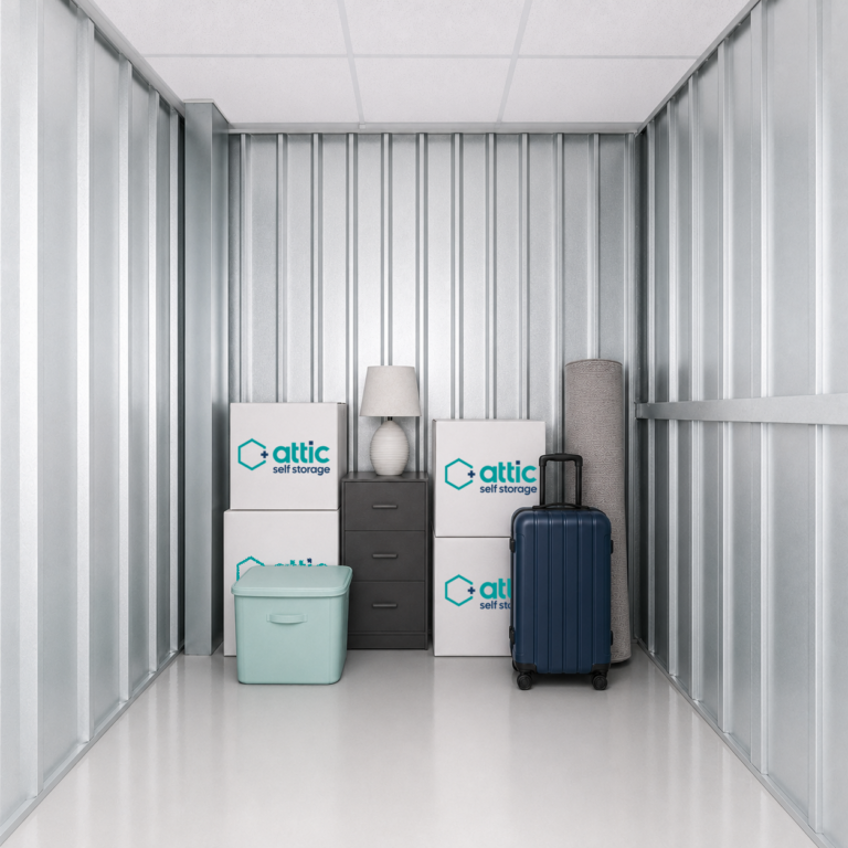 35 sq ft storage unit filled with moving boxes, suitcase and a few other household items
