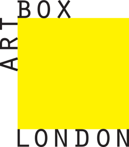 A yellow box with the text "Art Box London" printed on the front in black capital letters.