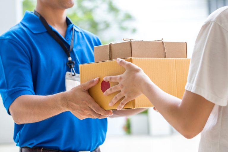 delivery man delivering packages